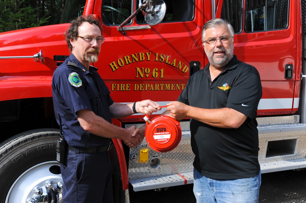 Brian donating the DSPA to the Fire Chief